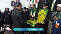 استقبال از پرچم مطهر رضوی در منزل شهدا