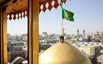 تعویض پرچم گنبد منور رضوی در سوم ربیع‌الاول